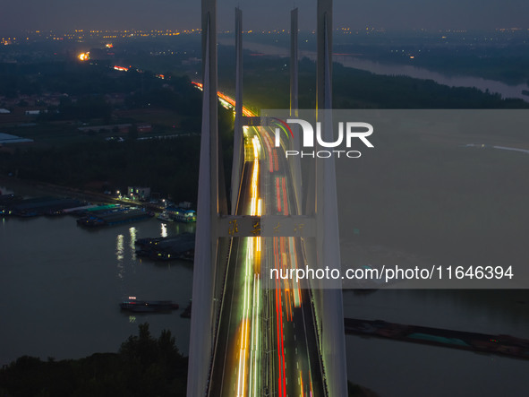 A large number of vehicles return on a highway in Huai'an, China, on October 7, 2024. 