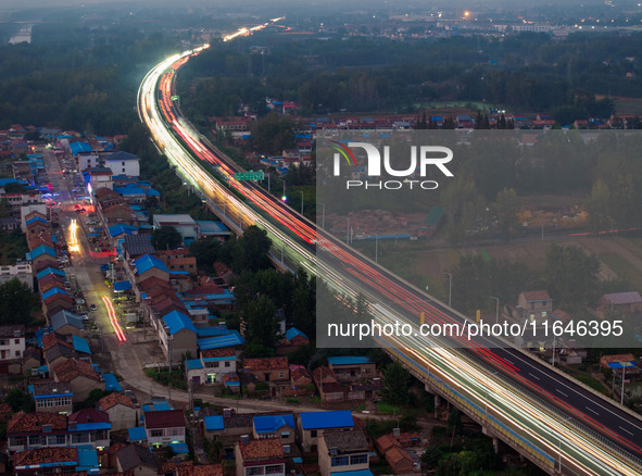 A large number of vehicles return on a highway in Huai'an, China, on October 7, 2024. 