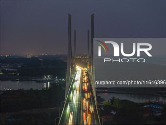 A large number of vehicles return on a highway in Huai'an, China, on October 7, 2024. (