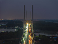 A large number of vehicles return on a highway in Huai'an, China, on October 7, 2024. (