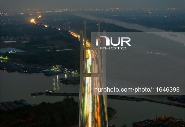 A large number of vehicles return on a highway in Huai'an, China, on October 7, 2024. 