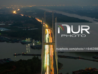 A large number of vehicles return on a highway in Huai'an, China, on October 7, 2024. (