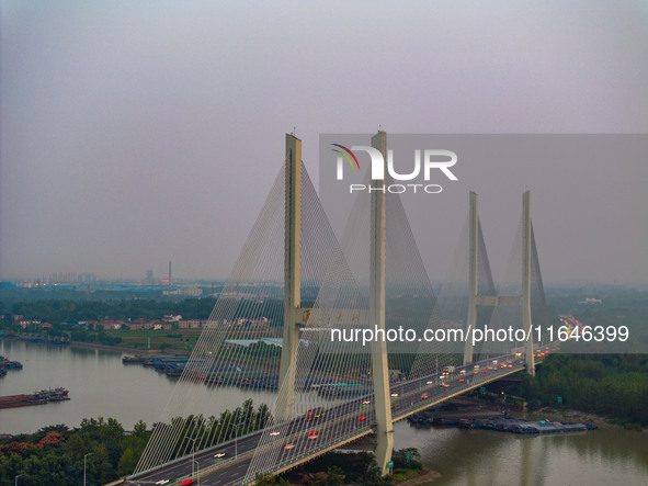 A large number of vehicles return on a highway in Huai'an, China, on October 7, 2024. 