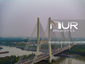 A large number of vehicles return on a highway in Huai'an, China, on October 7, 2024. (