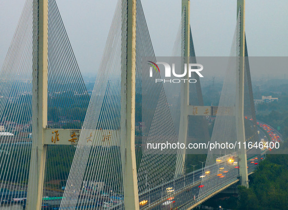 A large number of vehicles return on a highway in Huai'an, China, on October 7, 2024. 