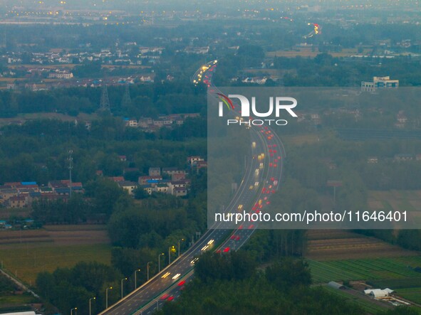 A large number of vehicles return on a highway in Huai'an, China, on October 7, 2024. 