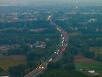 A large number of vehicles return on a highway in Huai'an, China, on October 7, 2024. (