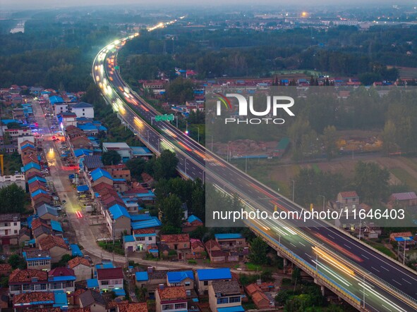 A large number of vehicles return on a highway in Huai'an, China, on October 7, 2024. 