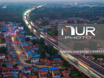 A large number of vehicles return on a highway in Huai'an, China, on October 7, 2024. (