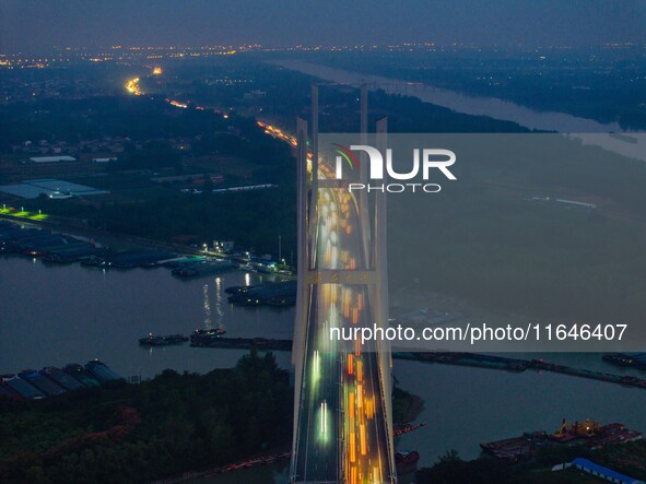 A large number of vehicles return on a highway in Huai'an, China, on October 7, 2024. 