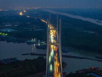 A large number of vehicles return on a highway in Huai'an, China, on October 7, 2024. (