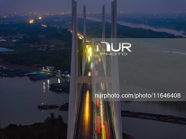 A large number of vehicles return on a highway in Huai'an, China, on October 7, 2024. 