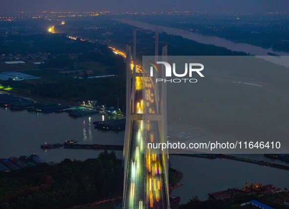 A large number of vehicles return on a highway in Huai'an, China, on October 7, 2024. 