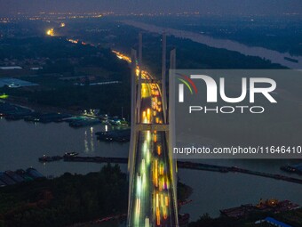 A large number of vehicles return on a highway in Huai'an, China, on October 7, 2024. (