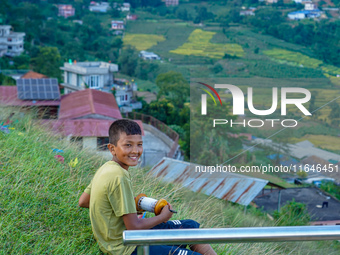 Kids fly kites on the occasion of the Dashain festival in the outskirts of Kathmandu, Nepal, on October 7, 2024. (