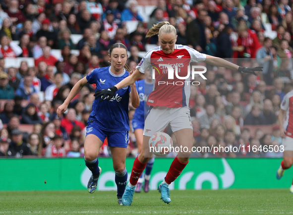 Arsenal's Frida Maanum runs with the ball during the Barclays FA Women's Super League match between Arsenal and Everton at the Emirates Stad...