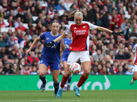 Arsenal's Frida Maanum runs with the ball during the Barclays FA Women's Super League match between Arsenal and Everton at the Emirates Stad...