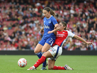 Kyra Cooney Cross of Arsenal tackles Clare Wheeler of Everton during the Barclays FA Women's Super League match between Arsenal and Everton...