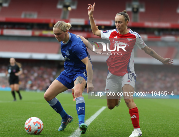 Everton's Lucy Hope and Arsenal's Caitlin Foord participate in the Barclays FA Women's Super League match between Arsenal and Everton at the...