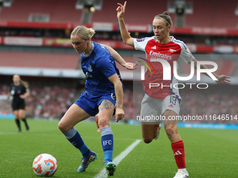 Everton's Lucy Hope and Arsenal's Caitlin Foord participate in the Barclays FA Women's Super League match between Arsenal and Everton at the...