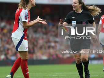 Laia Codina of Arsenal argues with the referee Stacey Pearson during the Barclays FA Women's Super League match between Arsenal and Everton...