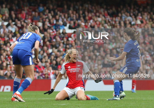 Frida Maanum of Arsenal goes down after pulling her groin during the Barclays FA Women's Super League match between Arsenal and Everton at t...