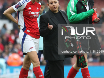 Lucy Williamson is with the communications manager after the Barclays FA Women's Super League match between Arsenal and Everton at the Emira...