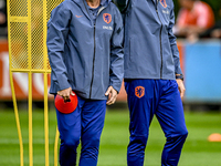 Netherlands assistant trainer Erwin Koeman and Netherlands assistant trainer Wim Jonk are present during the training and press conference f...