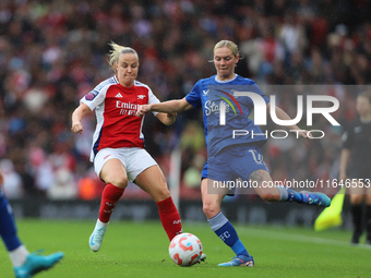 Beth Mead of Arsenal and Everton's Lucy Hope participate in the Barclays FA Women's Super League match between Arsenal and Everton at the Em...