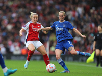 Beth Mead of Arsenal and Everton's Lucy Hope participate in the Barclays FA Women's Super League match between Arsenal and Everton at the Em...