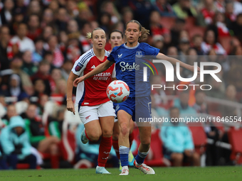 Caroline Olsen of Everton beats Arsenal's Beth Mead to the ball during the Barclays FA Women's Super League match between Arsenal and Everto...