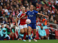 Caroline Olsen of Everton beats Arsenal's Beth Mead to the ball during the Barclays FA Women's Super League match between Arsenal and Everto...