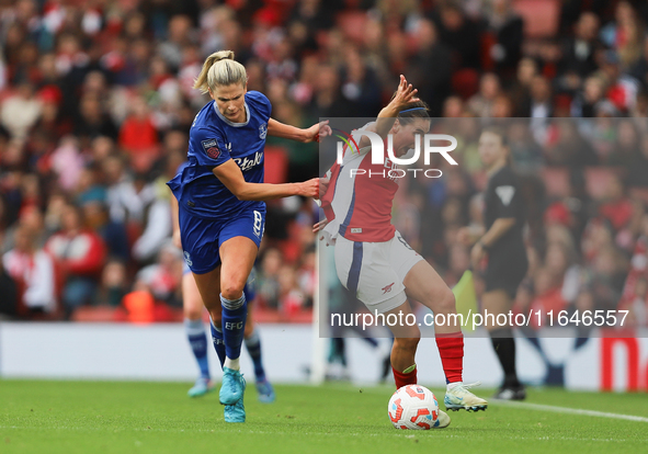 Justine Vanhavermaet of Everton pulls Mariona Caldentey of Arsenal's shirt during the Barclays FA Women's Super League match between Arsenal...