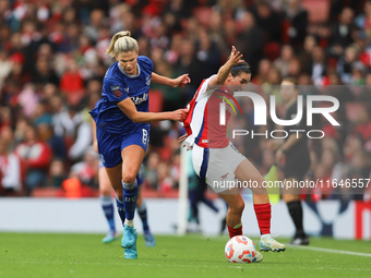 Justine Vanhavermaet of Everton pulls Mariona Caldentey of Arsenal's shirt during the Barclays FA Women's Super League match between Arsenal...