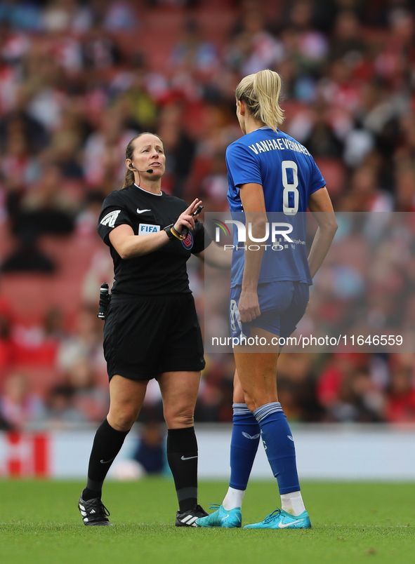 Referee Stacey Pearson speaks with Justine Vanhavermaet of Everton during the Barclays FA Women's Super League match between Arsenal and Eve...