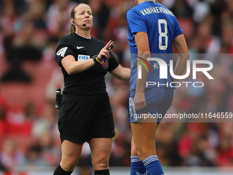 Referee Stacey Pearson speaks with Justine Vanhavermaet of Everton during the Barclays FA Women's Super League match between Arsenal and Eve...