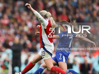 Arsenal's Alessia Russo and Everton's Clare Wheeler participate in the Barclays FA Women's Super League match between Arsenal and Everton at...