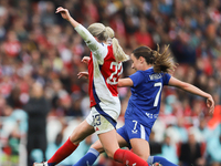 Arsenal's Alessia Russo and Everton's Clare Wheeler participate in the Barclays FA Women's Super League match between Arsenal and Everton at...