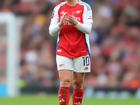 Kim Little, the Arsenal captain, keeps the team spirit going during the Barclays FA Women's Super League match between Arsenal and Everton a...