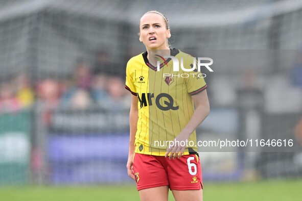 Sophie Mclean, 6, from Watford, looks up during the FA Women's Premier League Premier Division match between Ipswich Town Women and Watford...