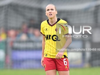 Sophie Mclean, 6, from Watford, looks up during the FA Women's Premier League Premier Division match between Ipswich Town Women and Watford...