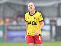 Sophie Mclean, 6, from Watford, looks up during the FA Women's Premier League Premier Division match between Ipswich Town Women and Watford...