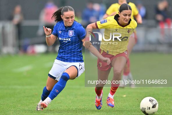 Andria Georgiou, 15, from Watford, is challenged by Sophie Peskett, 17, from Ipswich, during the FA Women's Premier League Premier Division...