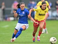 Andria Georgiou, 15, from Watford, is challenged by Sophie Peskett, 17, from Ipswich, during the FA Women's Premier League Premier Division...