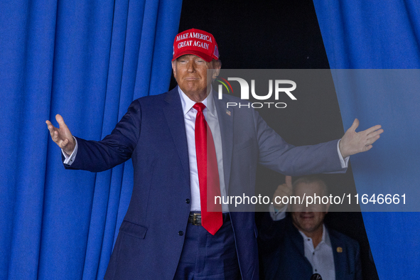 Former President Donald Trump, the Republican presidential nominee, holds a campaign rally at Dodge County Airport in Juneau, Wisconsin, on...