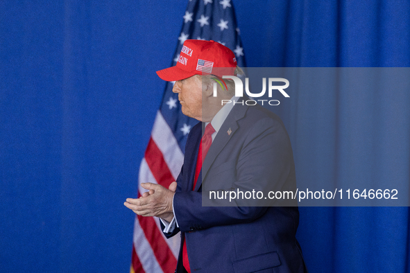 Former President Donald Trump, the Republican presidential nominee, holds a campaign rally at Dodge County Airport in Juneau, Wisconsin, on...