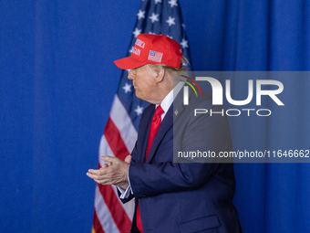 Former President Donald Trump, the Republican presidential nominee, holds a campaign rally at Dodge County Airport in Juneau, Wisconsin, on...