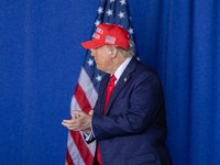 Former President Donald Trump, the Republican presidential nominee, holds a campaign rally at Dodge County Airport in Juneau, Wisconsin, on...