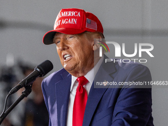 Former President Donald Trump, the Republican presidential nominee, holds a campaign rally at Dodge County Airport in Juneau, Wisconsin, on...