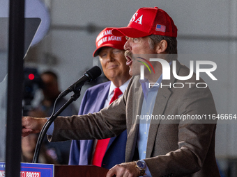 Former President Donald Trump, the Republican presidential nominee, holds a campaign rally at Dodge County Airport in Juneau, Wisconsin, on...